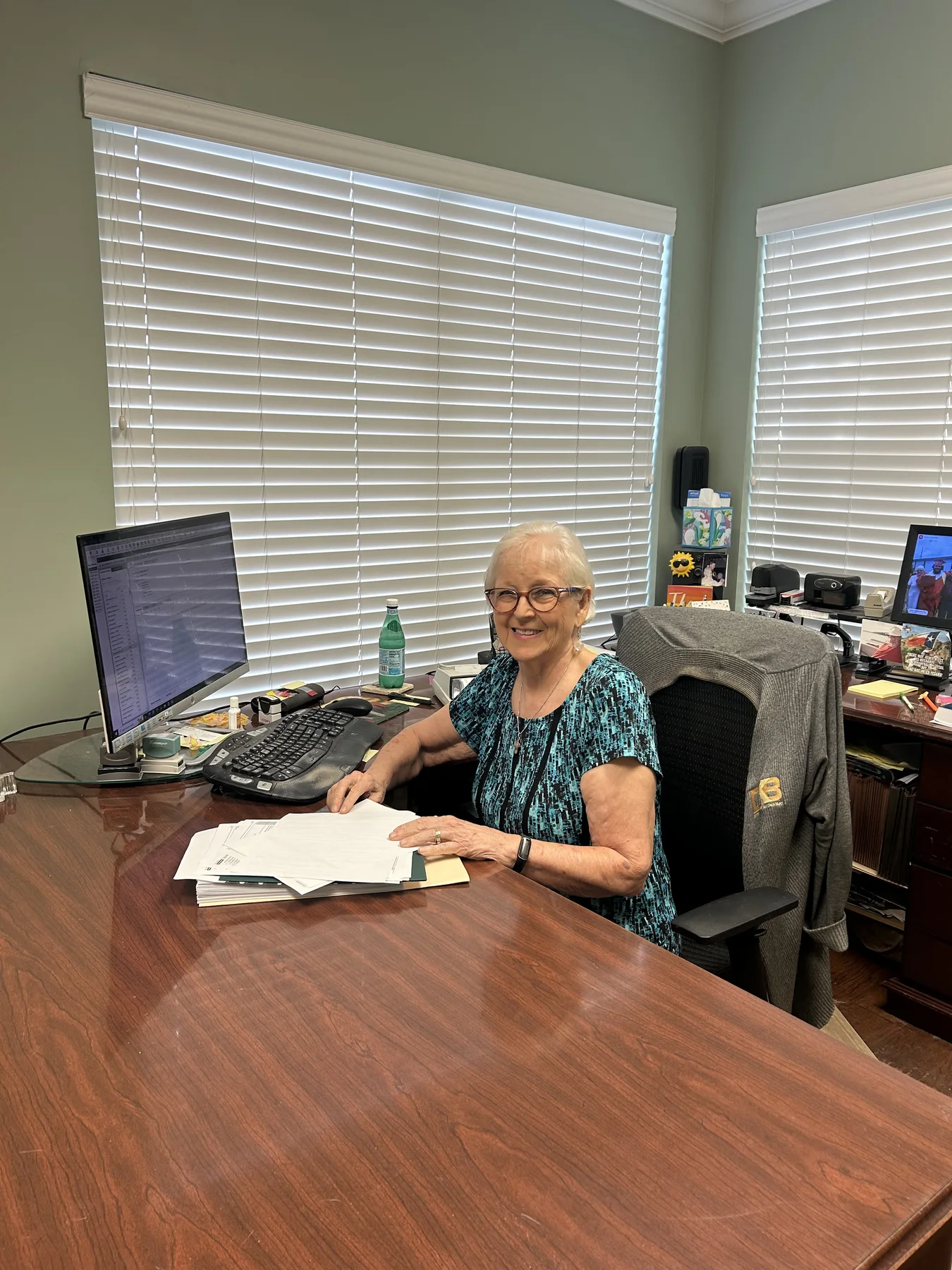 Dianne Briery reviewing documents at her desk